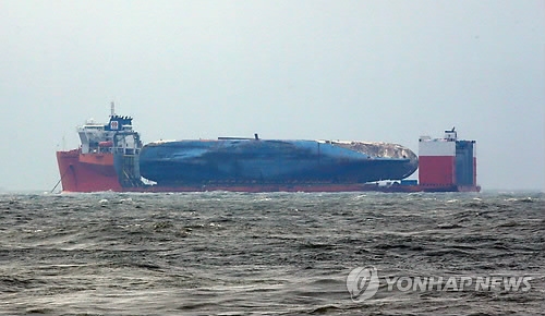 Operation to move Sewol to shore enters final phase: gov't - 1