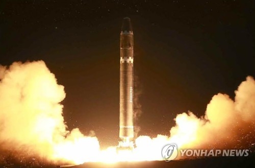 This photo, carried by North Korea's Rodong Sinmun, on Nov. 30, 2017, shows the North's firing of an intercontinental ballistic missile, known as the Hwasong-15, a day earlier. (For Use Only in the Republic of Korea. No Redistribution) (Yonhap)