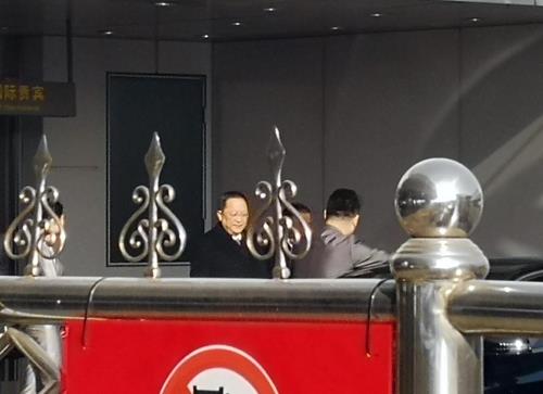 North Korean Foreign Minister Ri Yong-ho leaves Beijing's Capital International Airport on Nov. 29. (Yonhap)