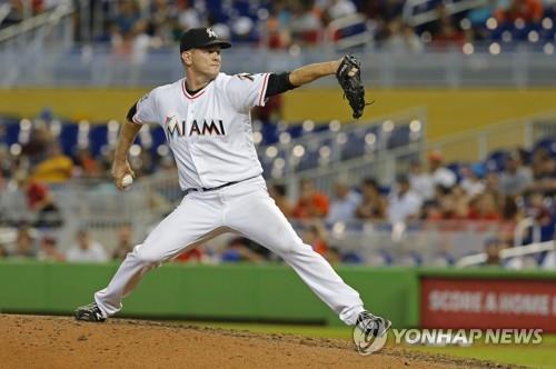 In this Associated Press file photo from Sept. 23, 2018, Drew Rucinski, then with the Miami Marlins, throws a pitch against the Cincinnati Reds in the top of the ninth inning of a Major League Baseball regular season game at Marlins Park in Miami. Rucinski will pitch for the NC Dinos in the Korea Baseball Organization in 2019. (Yonhap)