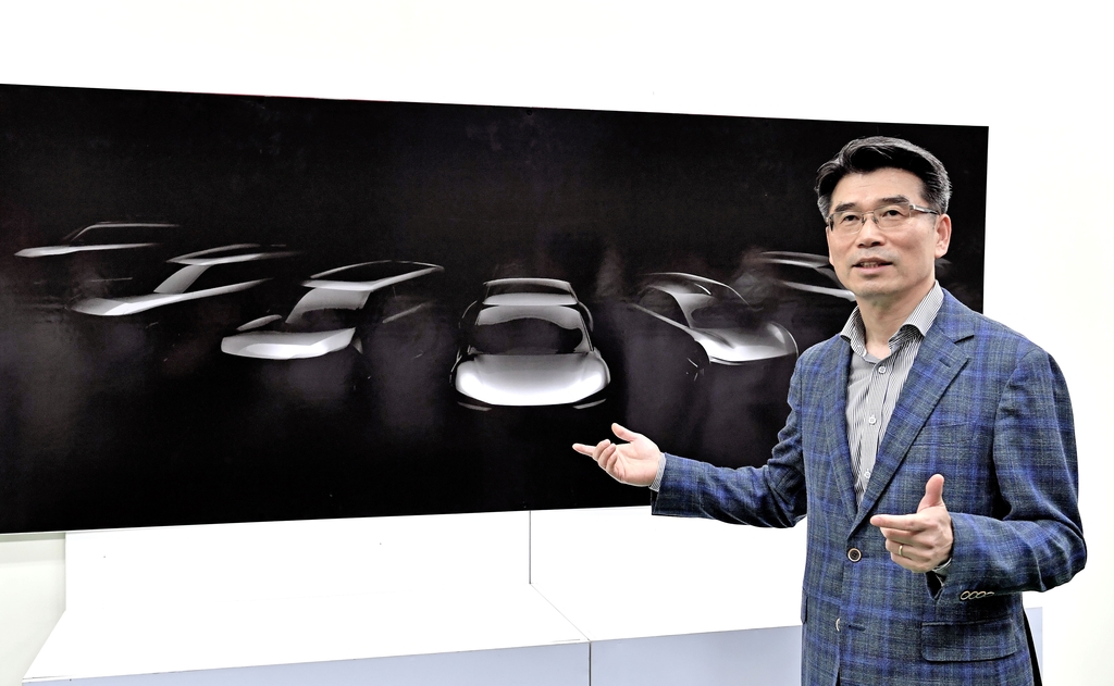In this photo taken Sept. 16. 2020, and provided by Kia Motors, the company's President Song Ho-sung delivers a briefing on upcoming EV models at its plant in Hwaseong, south of Seoul. (PHOTO NOT FOR SALE) (Yonhap) 