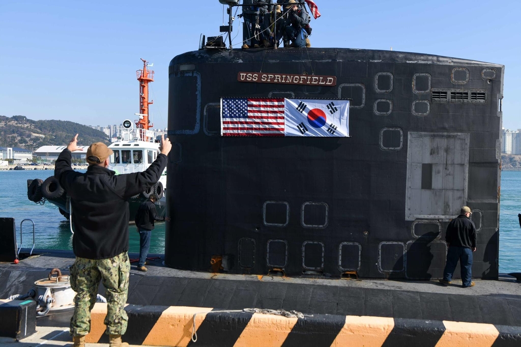 The national flags of South Korea and the United States are attached to the conning tower of the USS Springfield nuclear-powered fast attack submarine on Feb. 25, 2023, as it arrived at the naval base in South Korea's southern port city of Busan for a scheduled visit, in this photo provided by the U.S. Pacific Fleet. (PHOTO NOT FOR SALE) (Yonhap)