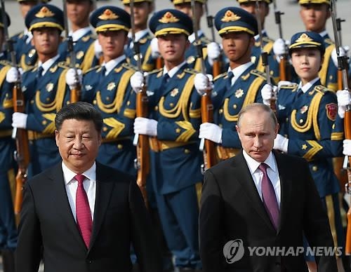 시진핑·푸틴 "北핵미사일전략 수용불가…유엔결의 전면 집행" - 2