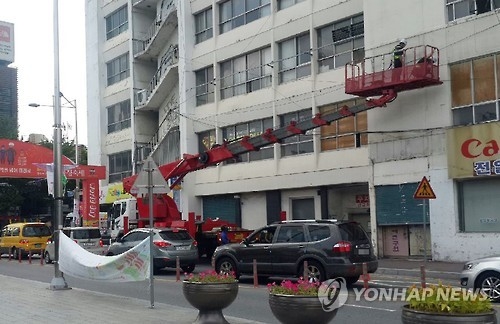 전일빌딩 현장감식 중인 국과수.