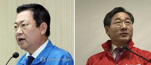 박남춘 후보(왼쪽)와 유정복 후보
