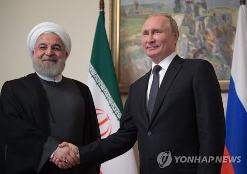이달 2일 만난 하산 로하니 이란 대통령(좌)과 블라디미르 푸틴 러시아 대통령 