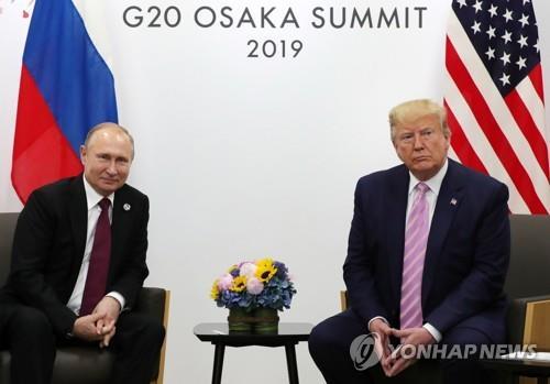 푸틴 러시아 대통령(왼쪽)과 트럼프 미국 대통령