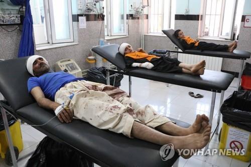 7월 22일 아프가니스탄 헤라트의 병원에 공습 관련 부상으로 입원한 민간인. [EPA=연합뉴스]
