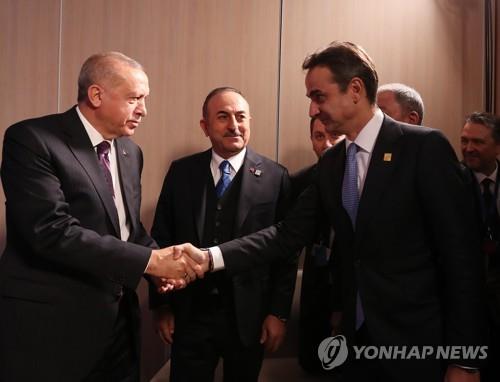 터키 에르도안 대통령(좌)과 그리스 미초타키스 총리(우)