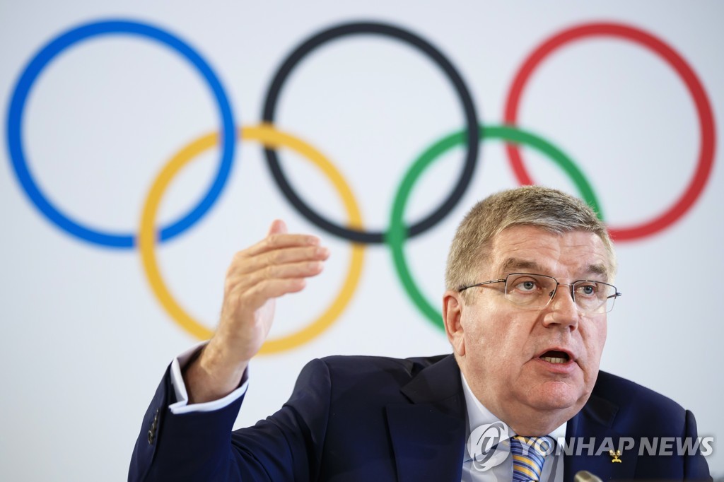 In this Associated Press file photo from July 20, 2018, Thomas Bach, president of the International Olympic Committee (IOC), speaks at a press conference after an IOC executive board meeting in Lausanne, Switzerland. (Yonhap)