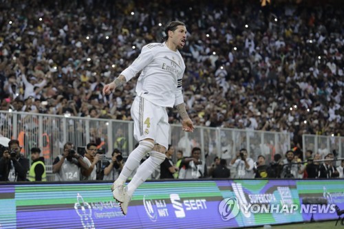 승부차기에서 승리를 확정짓는 골을 터트린 뒤 기뻐하는 레알 마드리드의 라모스 / AP=연합뉴스