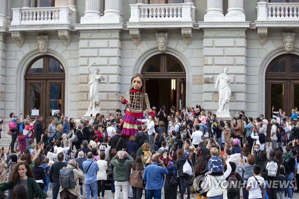 SWITZERLAND GIANT PUPPET AMAL REFUGEES
