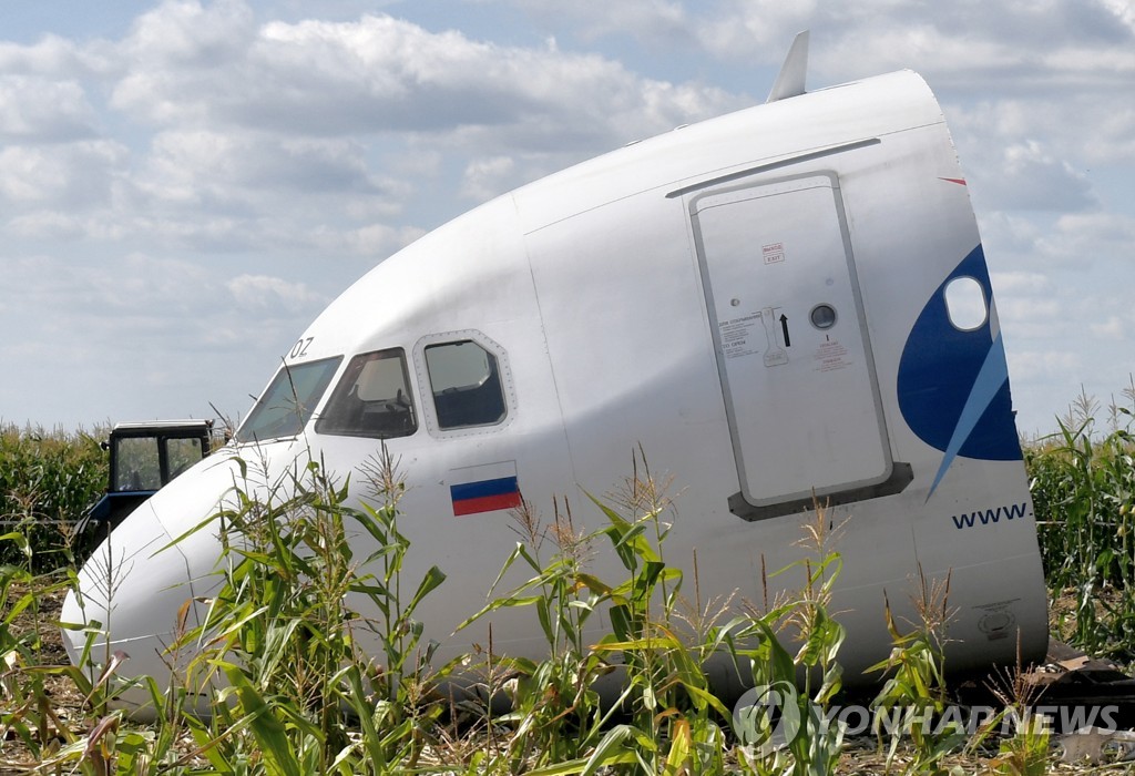 Dismantling Airbus A321 jet at crash landing site near Zhukovsky Airport