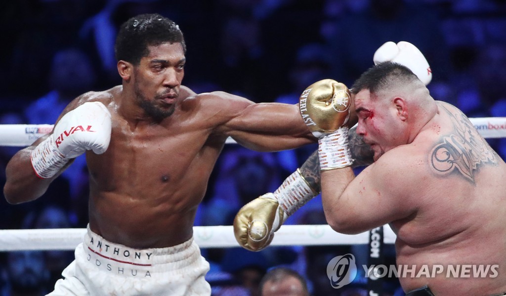 British boxer Anthony Joshua wins back his world heavyweight titles in Saudi Arabia