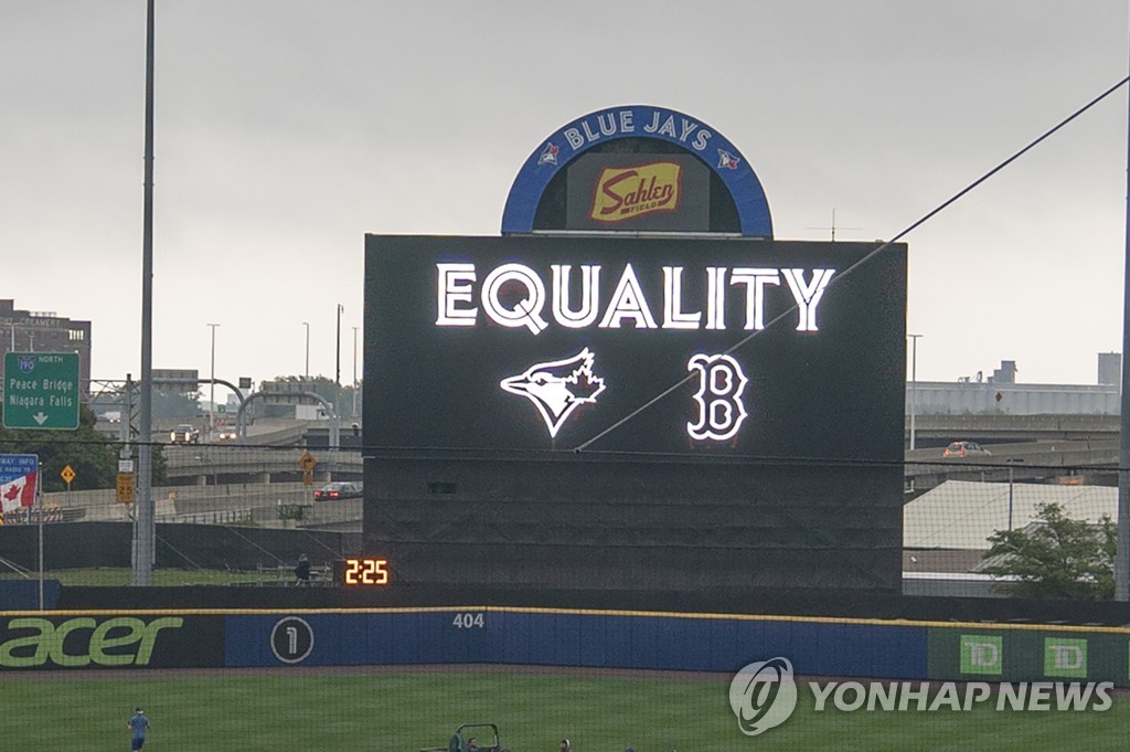 In this USA Today Sports photo via Reuters, the scoreboard at Sahlen Field in Buffalo, New York, flashes the word "Equality" prior to a Major League Baseball regular season game between the home team Toronto Blue Jays and the Boston Red Sox on Aug. 27, 2020. The game was postponed in the clubs' protest of a recent police shooting of a black man in Wisconsin. (Yonhap)