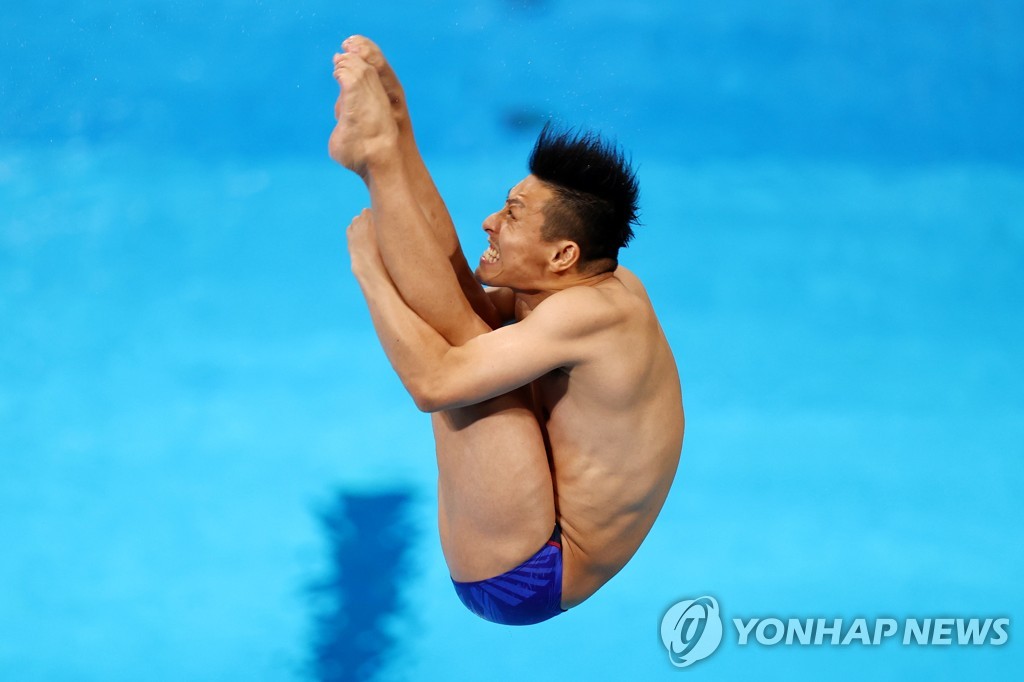 일본의 다이빙 전설 데라우치 겐의 경기 모습.