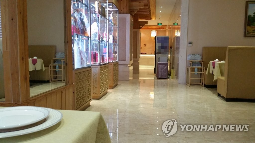 시안의 북한식당, '탈출의심'