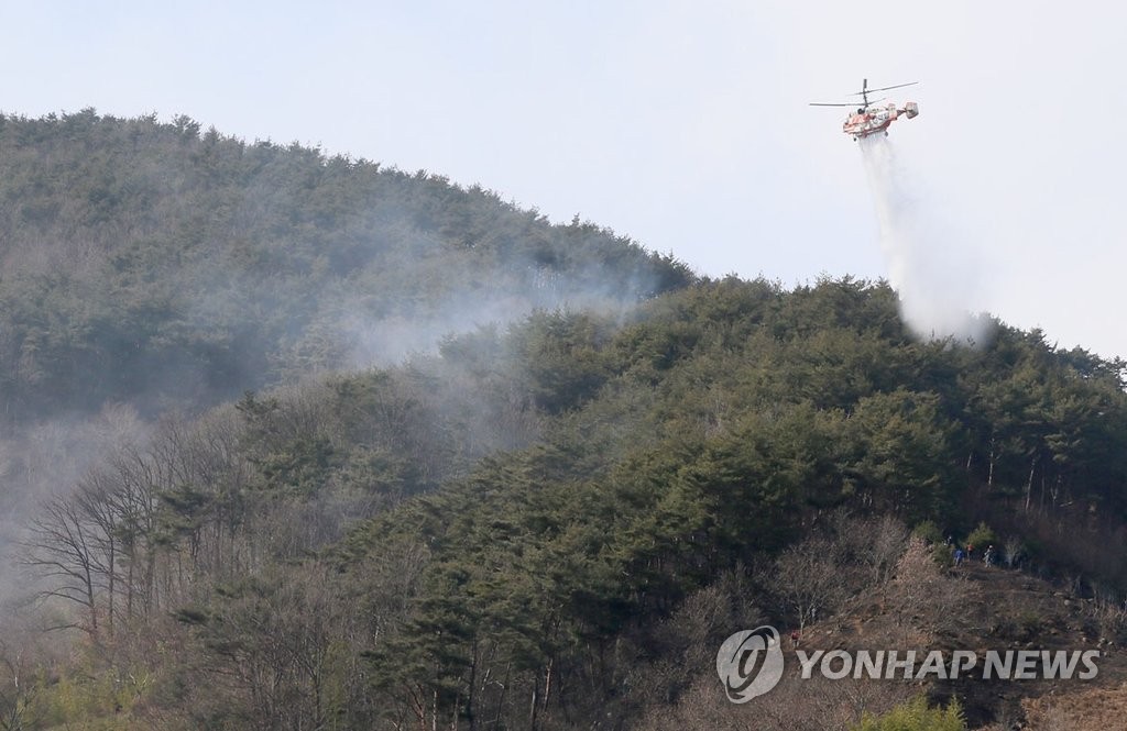 산으로 번진 주택 화재