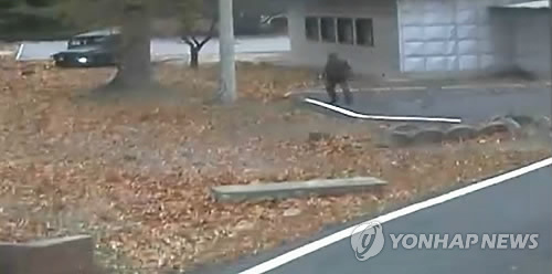 군사분계선 넘어 머뭇거리는 추격 북한군
