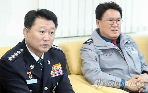 이철성 전 경찰청장과 황운하 전 울산청장(현 대전청장)