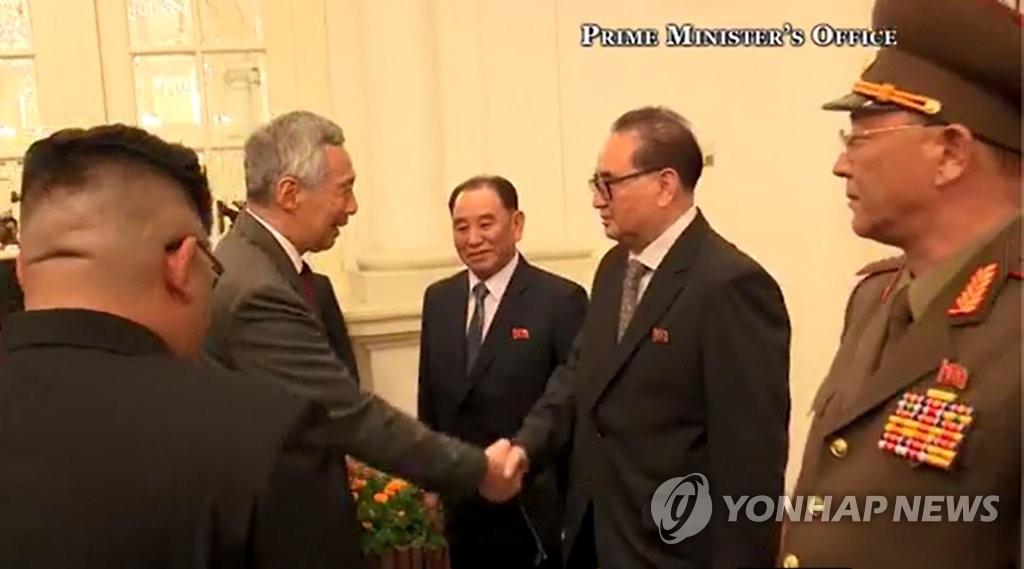 싱가포르 함께 방문한 김정은 측근들