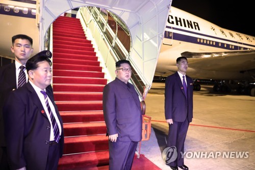 싱가포르 떠나는 김정은 위원장