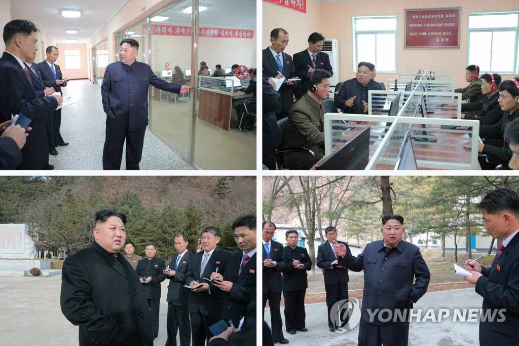 N.K. leader visits glass factory N.K. leader visits glass factory