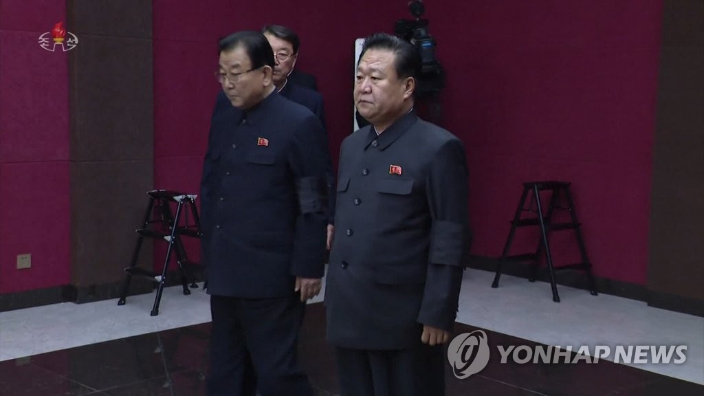 This photo, captured from North Korean TV, shows Choe Ryong-hae (R), vice chairman of the ruling Workers' Party. (For Use Only in the Republic of Korea. No Redistribution.) (Yonhap)