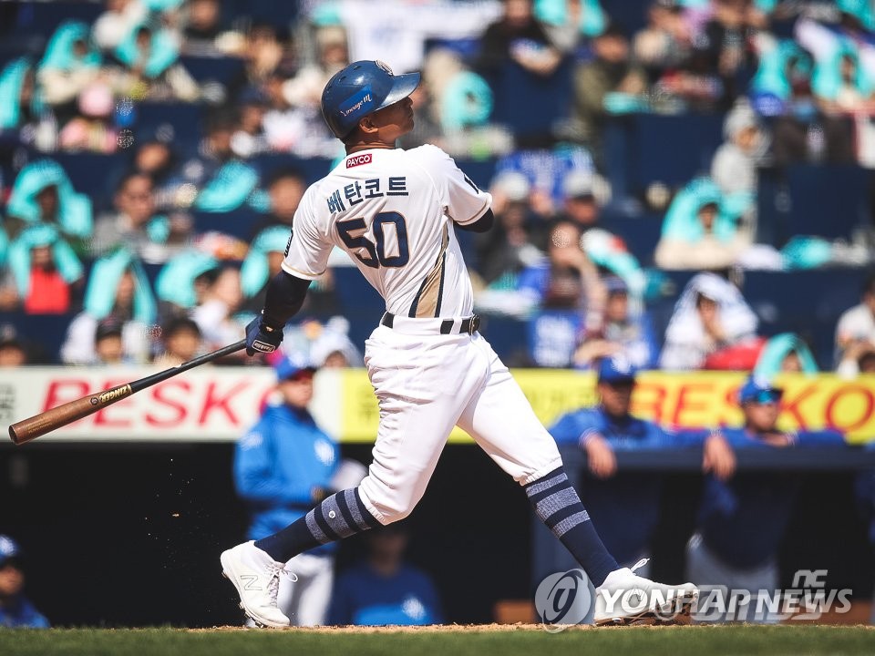 In this March 23, 2019, photo provided by the NC Dinos, Christian Bethancourt watches his three-run home run against the Samsung Lions in the bottom of the first inning of a Korea Baseball Organization regular season game at Changwon NC Park in Changwon, 400 kilometers southeast of Seoul. (Yonhap)