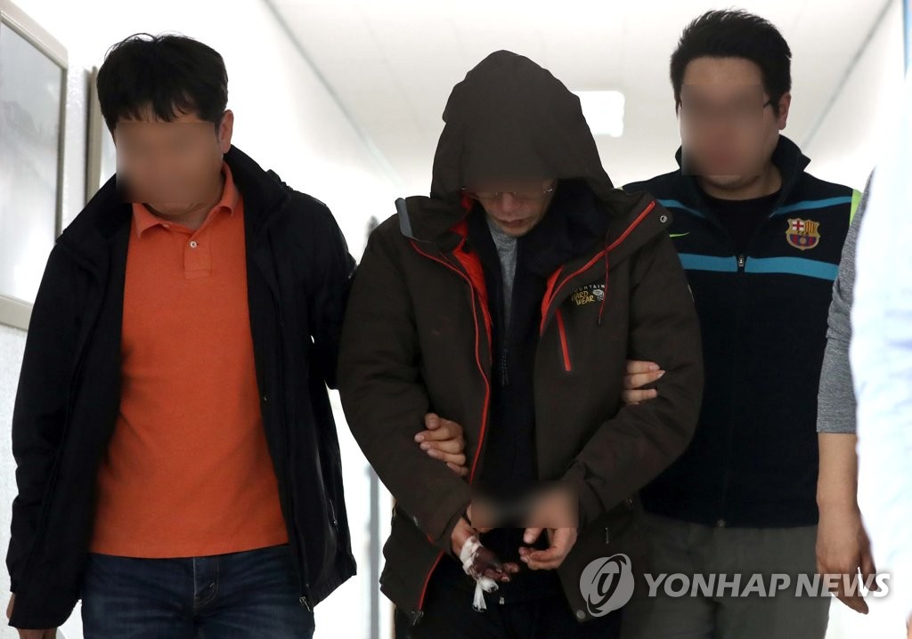 Arrested murder suspect Arrested murder suspect