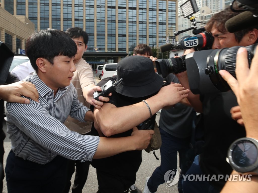 Man suspected of assaulting Japanese woman leaves police station Man suspected of assaulting Japanese woman leaves police station