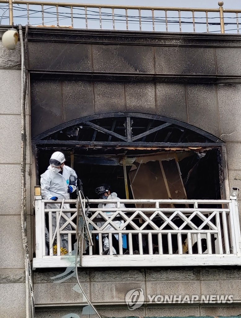 Inspectors at explosion scene Inspectors at explosion scene
