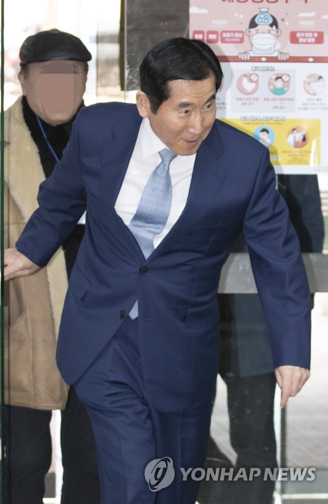 Ex-police chief gets two-year jail term Ex-police chief gets two-year jail term