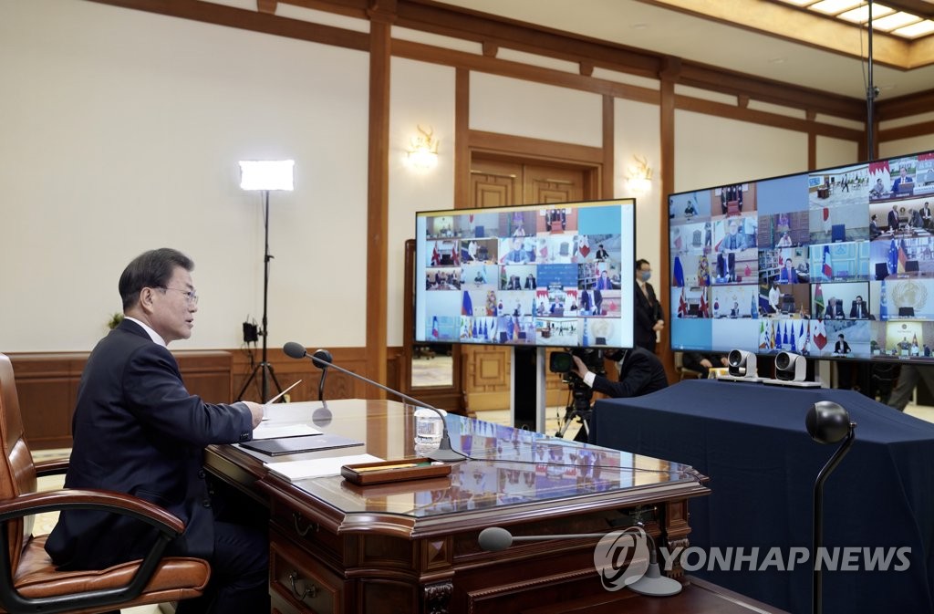 President Moon takes part in G-20 special teleconference President Moon takes part in G-20 special teleconference