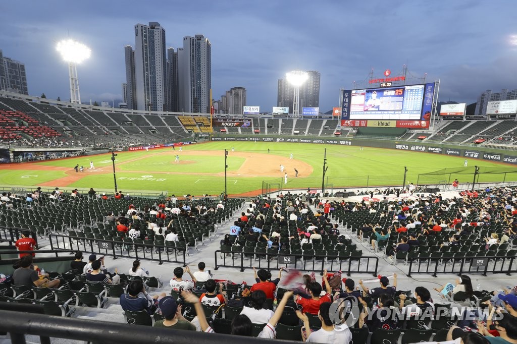 Cap on baseball crowds raised Cap on baseball crowds raised