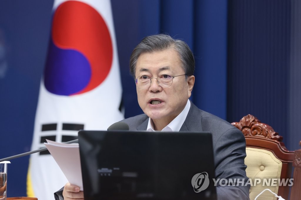 President Moon Jae-in speaks via videoconference during a Cabinet meeting at the presidential office Cheong Wa Dae in Seoul on Dec. 15, 2020. (Yonhap)