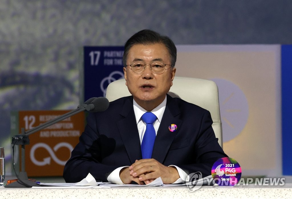 South Korean President Moon Jae-in delivers remarks during the Leaders' Dialogue session of the P4G Seoul Summit at Dongdaemun Design Plaza in Seoul on May 31, 2021. (Yonhap)