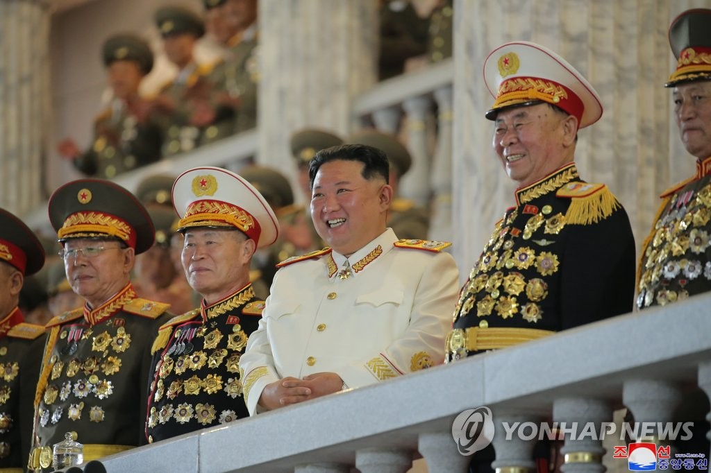 North Korean leader Kim Jong-un (C) and Ri Pyong-chol (2nd from R) attend a military parade at Kim Il-sung Square in Pyongyang on April 25, 2022, to mark the 90th anniversary of the Korean People's Revolutionary Army (KPRA), in this photo released the next day by the North's official Korean Central News Agency. (For Use Only in the Republic of Korea. No Redistribution) (Yonhap)