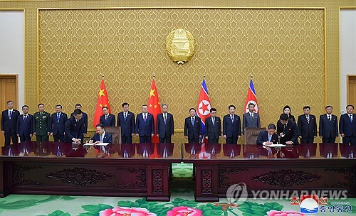 中 자오러지, 북한 최룡해와 회담