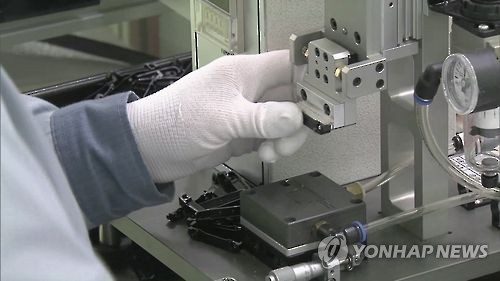 This undated file photo, provided by Yonhap News TV, shows a factory worker. (Yonhap)