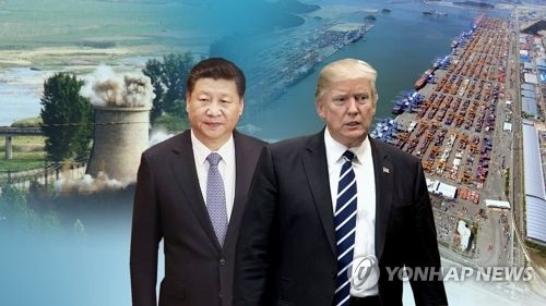An image of Chinese President Xi Jinping (L) and U.S. President Donald Trump in a photo provided by Yonhap News TV (Yonhap)