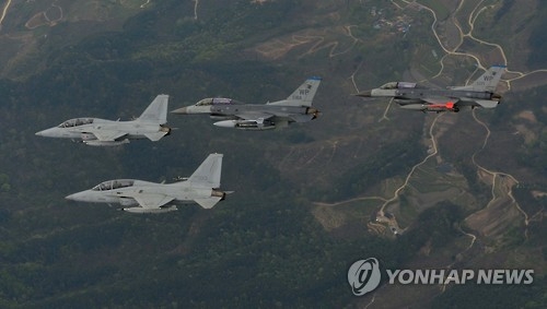 South Korean and U.S. fighter jets fly together in the 2016 Max Thunder exercise in this file photo provided by the South Korean Air Force. (Yonhap)