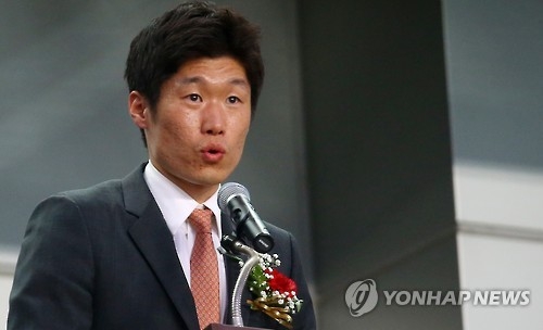In this file photo taken on May 18, 2016, Park Ji-sung speaks before a match between South Korea and Brazil at the Suwon JS Cup international youth football championship in Suwon, south of Seoul. (Yonhap)
