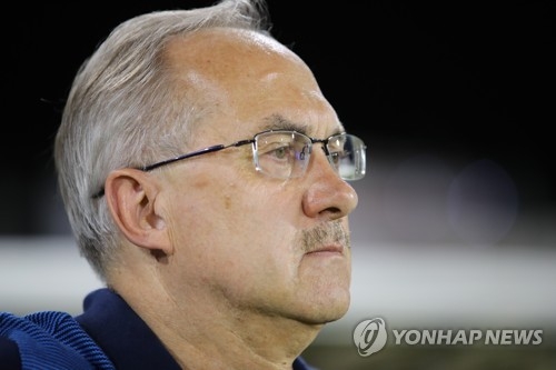 South Korea's national football team head coach Uli Stielike watches his players from the bench during a friendly match between South Korea and Iraq at Emirates Club Stadium in Ras Al Khaimah, the United Arab Emirates, on June 7, 2017. (Yonhap)