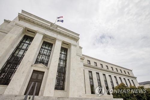 U.S. Fed raises key rates for 2nd time this year - 1