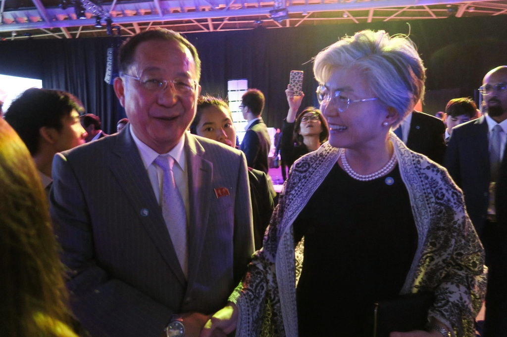 South Korean Foreign Minister Kang Kyung-wha (R) meets with her North Korean counterpart Ri Yong-ho during the ASEAN Regional Forum gala dinner in Singapore on Aug. 3, 2018 in this photo released by Kang's ministry. (Yonhap)