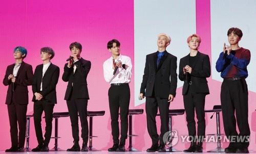 BTS poses for photos during a press conference on April 17, 2019. (Yonhap)