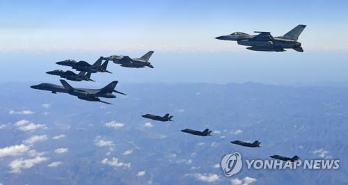 A B-1B Lancer strategic bomber, two F-35A and two F-35B stealth jets of the U.S., and two F-16K and two F-15K fighters of South Korea fly in formation over the Korean Peninsula in a joint Korea-U.S. air force drill, Vigilant Ace, on Dec. 6, 2017, in this photo provided by the air force. (Yonhap)