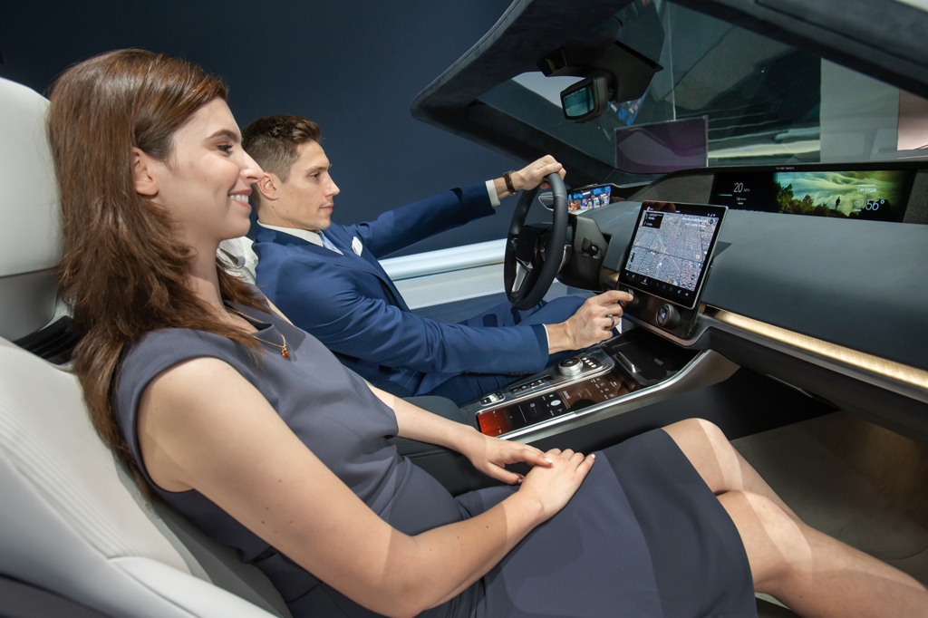 In this photo provided by Samsung Electronics Co. on Jan. 7, 2020, Samsung models introduce the company's digital cockpit for future cars at the Consumer Electronics Show 2020 in Las Vegas, Nevada. (PHOTO NOT FOR SALE) (Yonhap)