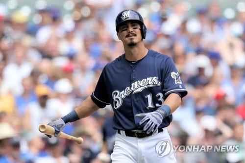 In this Getty Images file photo from July 28, 2019, Tyler Saladino of the Milwaukee Brewers reacts after striking out against the Chicago Cubs in the bottom of the fifth inning of a Major League Baseball regular season game at Miller Park in Milwaukee, Wisconsin. (Yonhap)